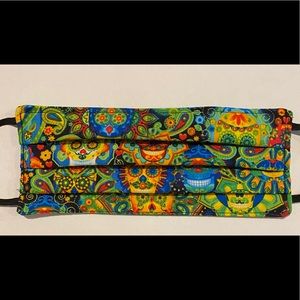 Vibrant sugar skull party on a mask!